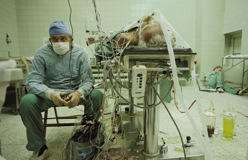 A heart surgeon after 23 hours long successful  heart transplantation